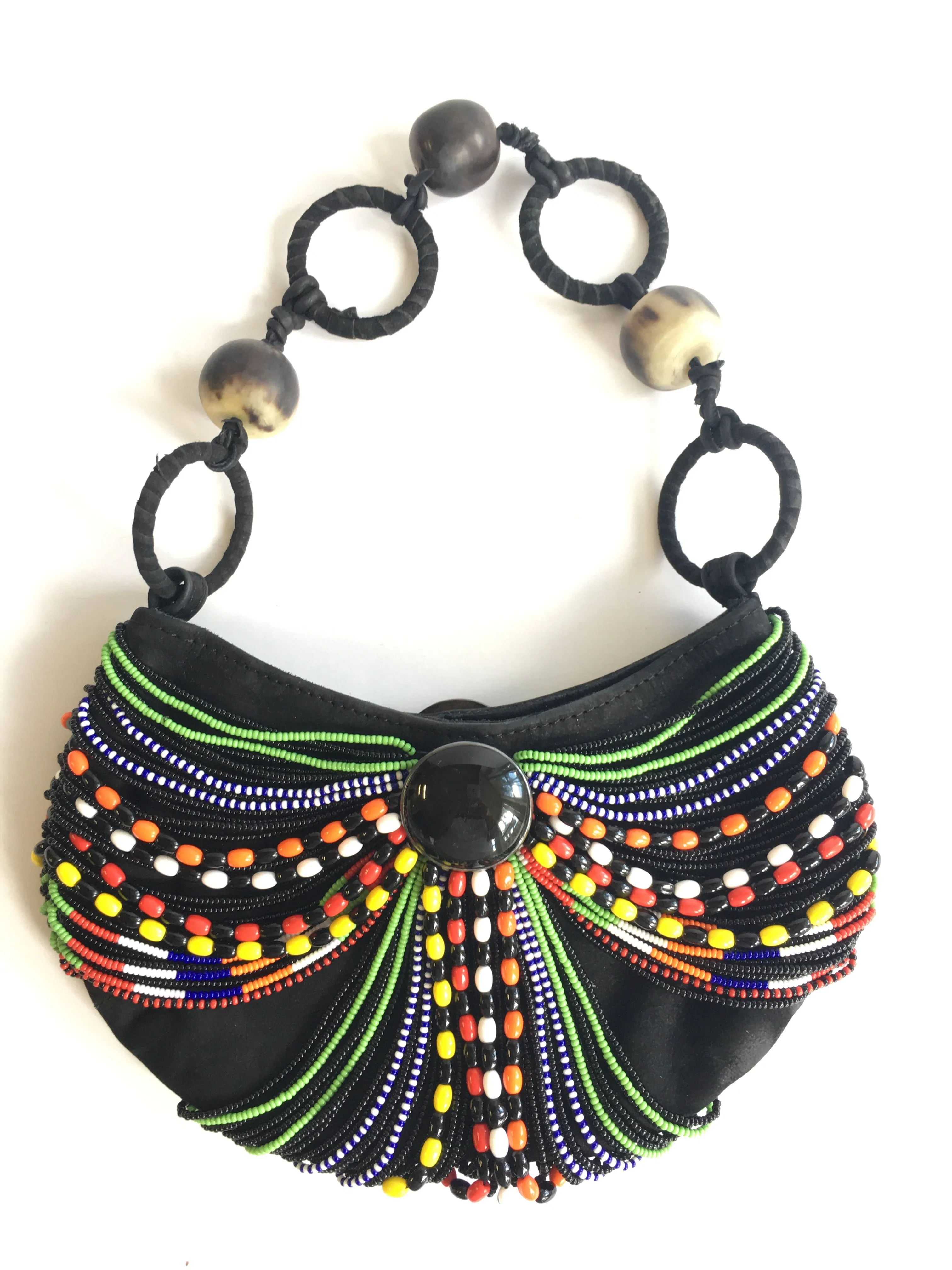 ANNA TRZEBINSKI SUEDE W/. AFRICAN BEADS AND COW HORN CLUTCH