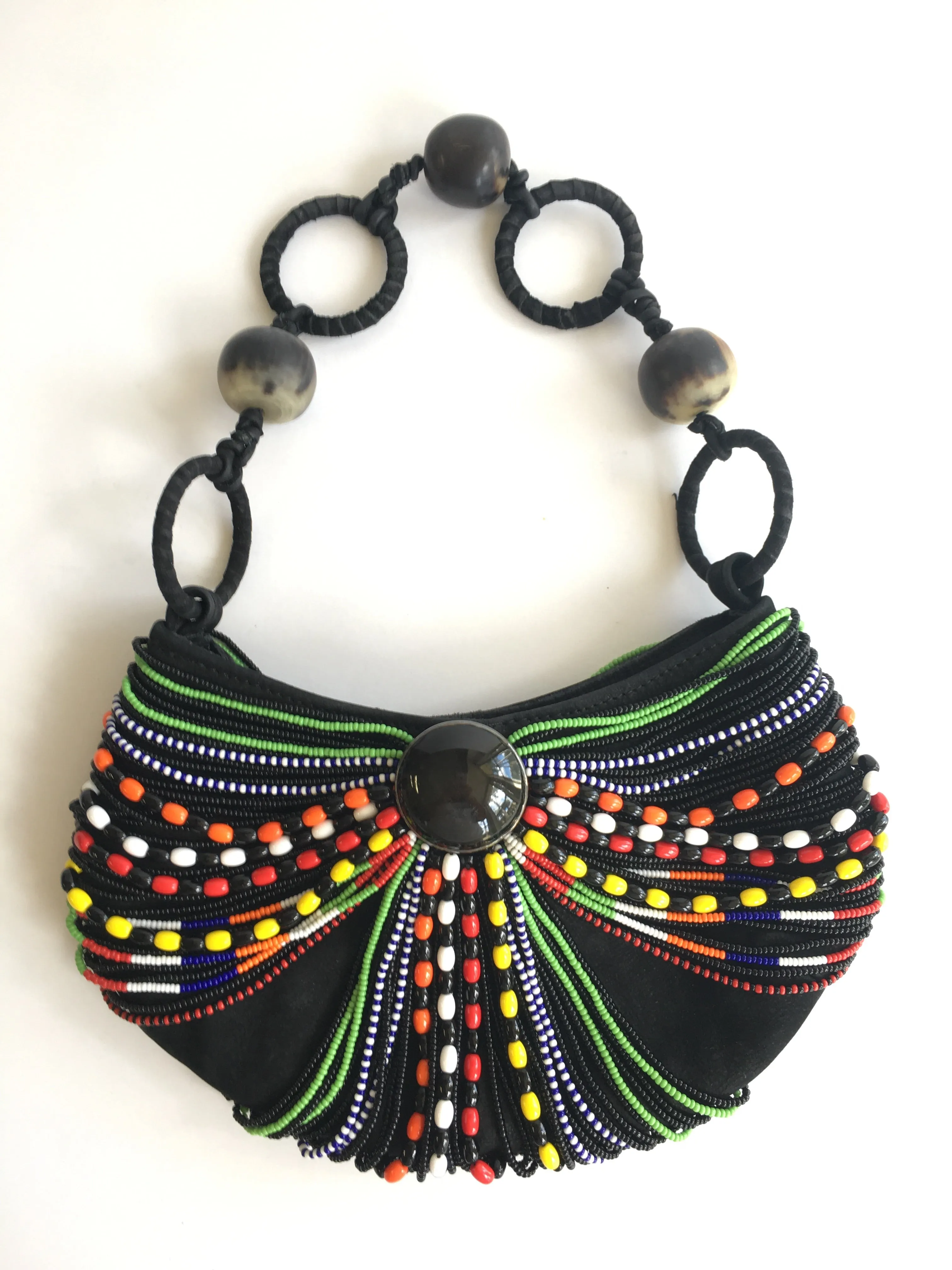 ANNA TRZEBINSKI SUEDE W/. AFRICAN BEADS AND COW HORN CLUTCH