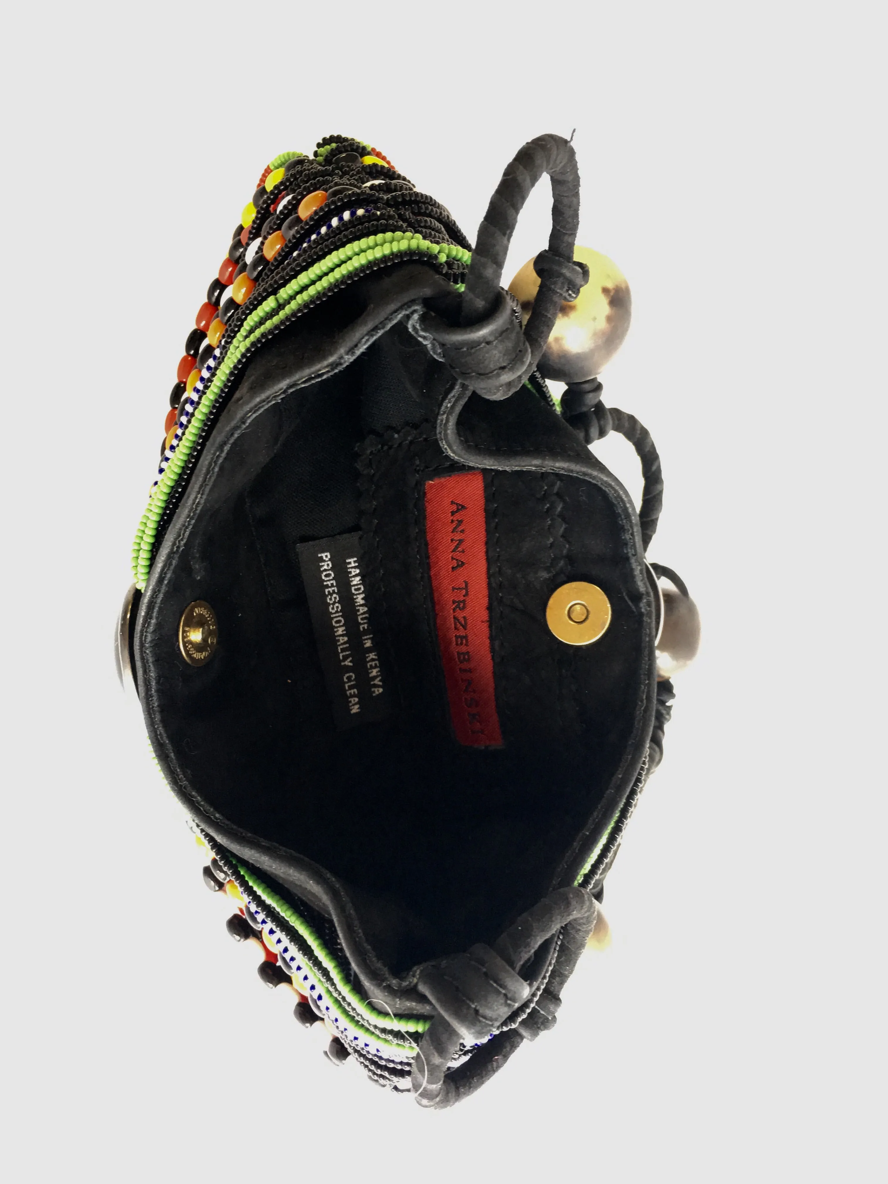 ANNA TRZEBINSKI SUEDE W/. AFRICAN BEADS AND COW HORN CLUTCH