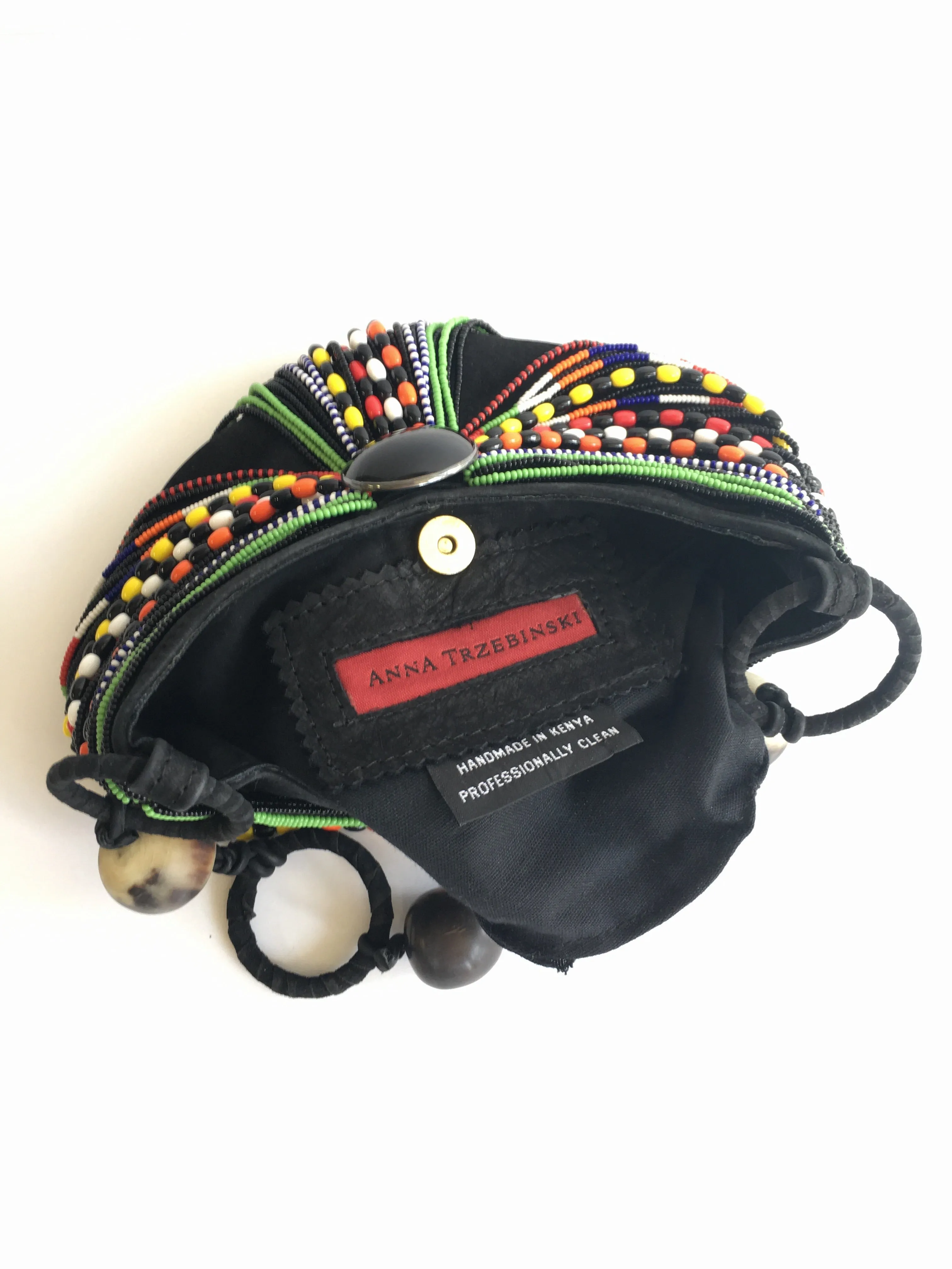 ANNA TRZEBINSKI SUEDE W/. AFRICAN BEADS AND COW HORN CLUTCH